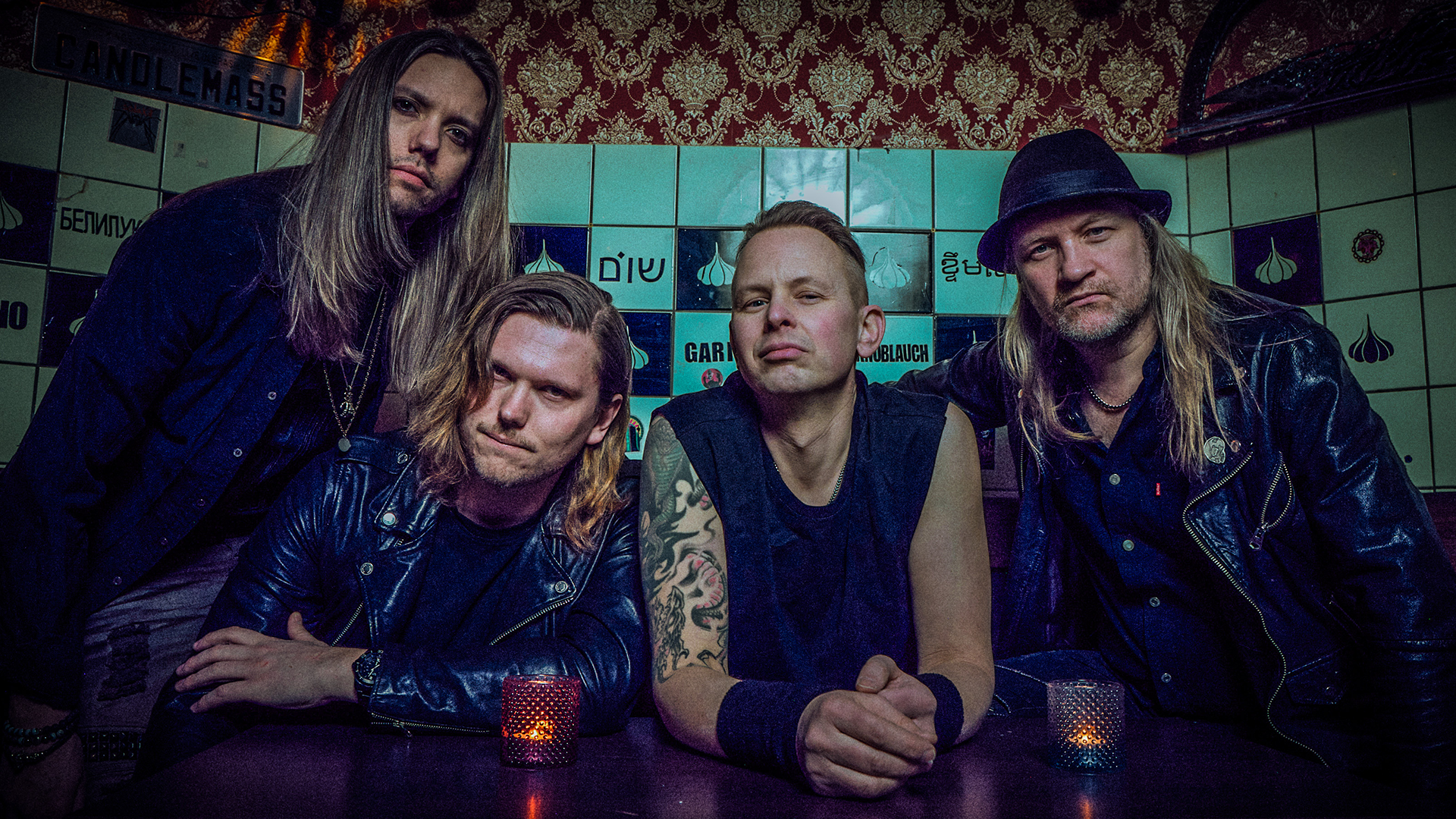 Eclipse band members sitting in booth